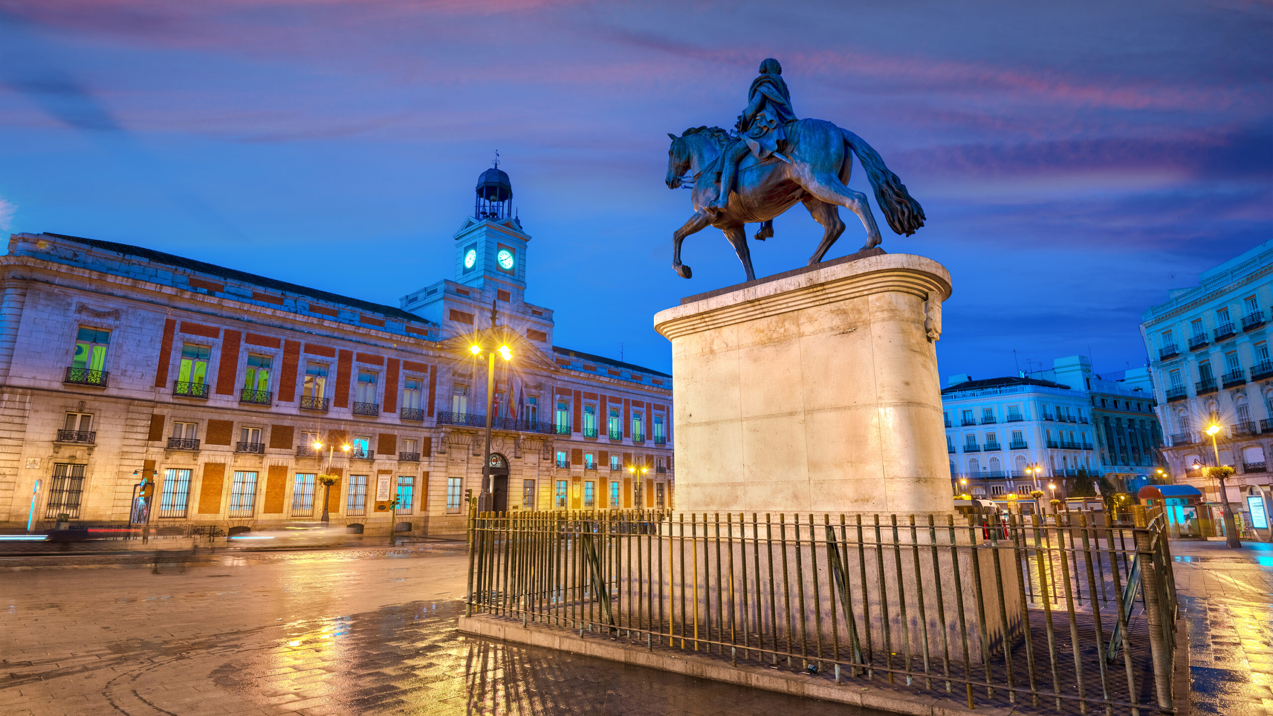 Madrid, Spain at Puerta del Sol at blue hour.